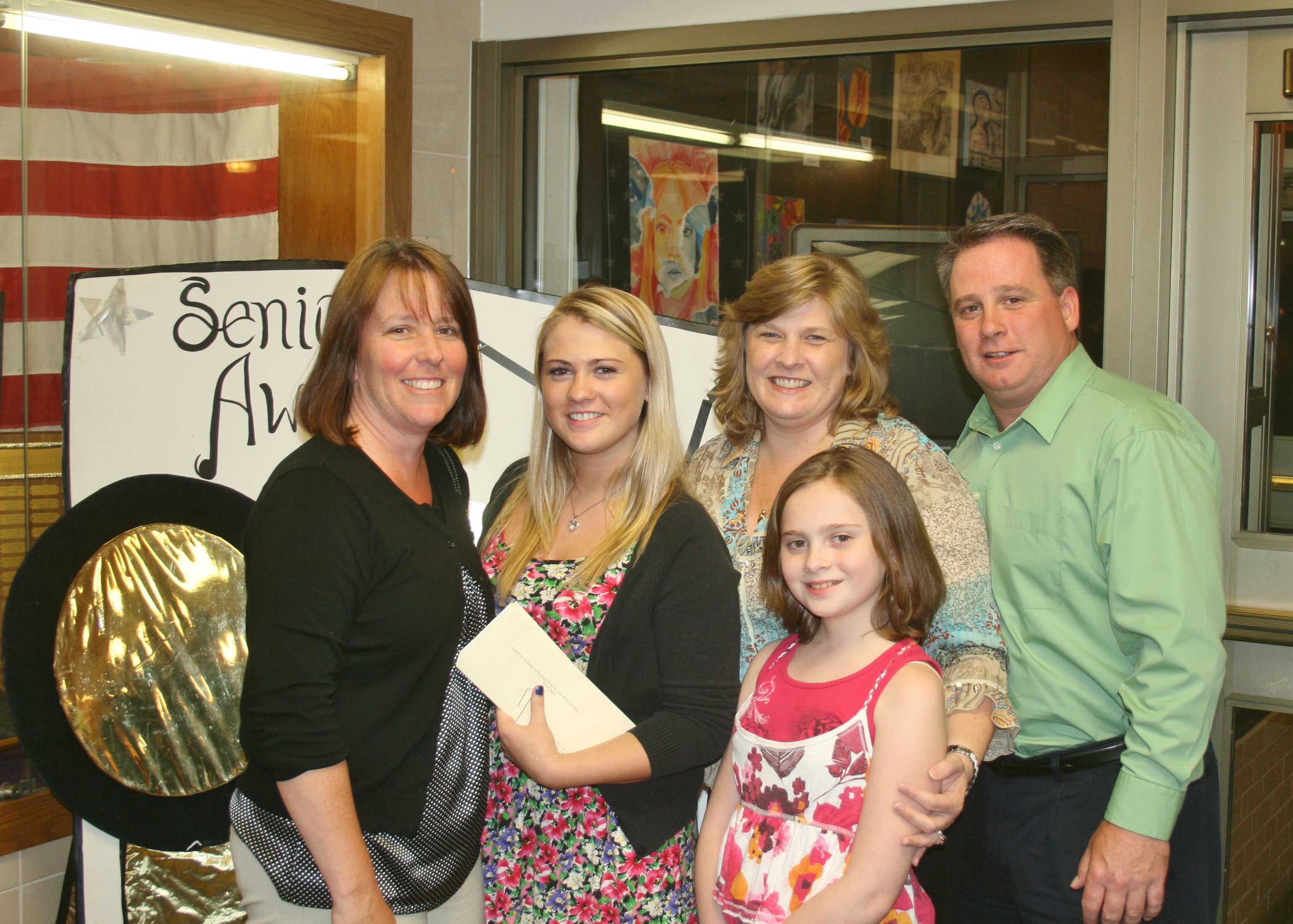 Nancy Orlando with Kelly Carroll and her family.
